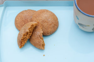 molasses cookies on blue tray