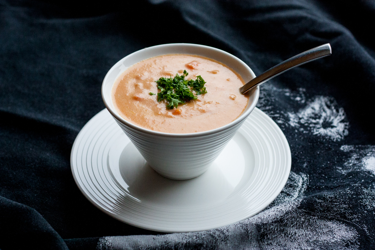 cheese soup with apple cider in a bowl