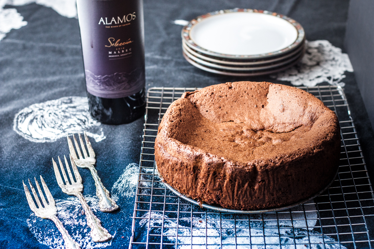 whole chocolate, ginger and hazelnut torte with wine bottle