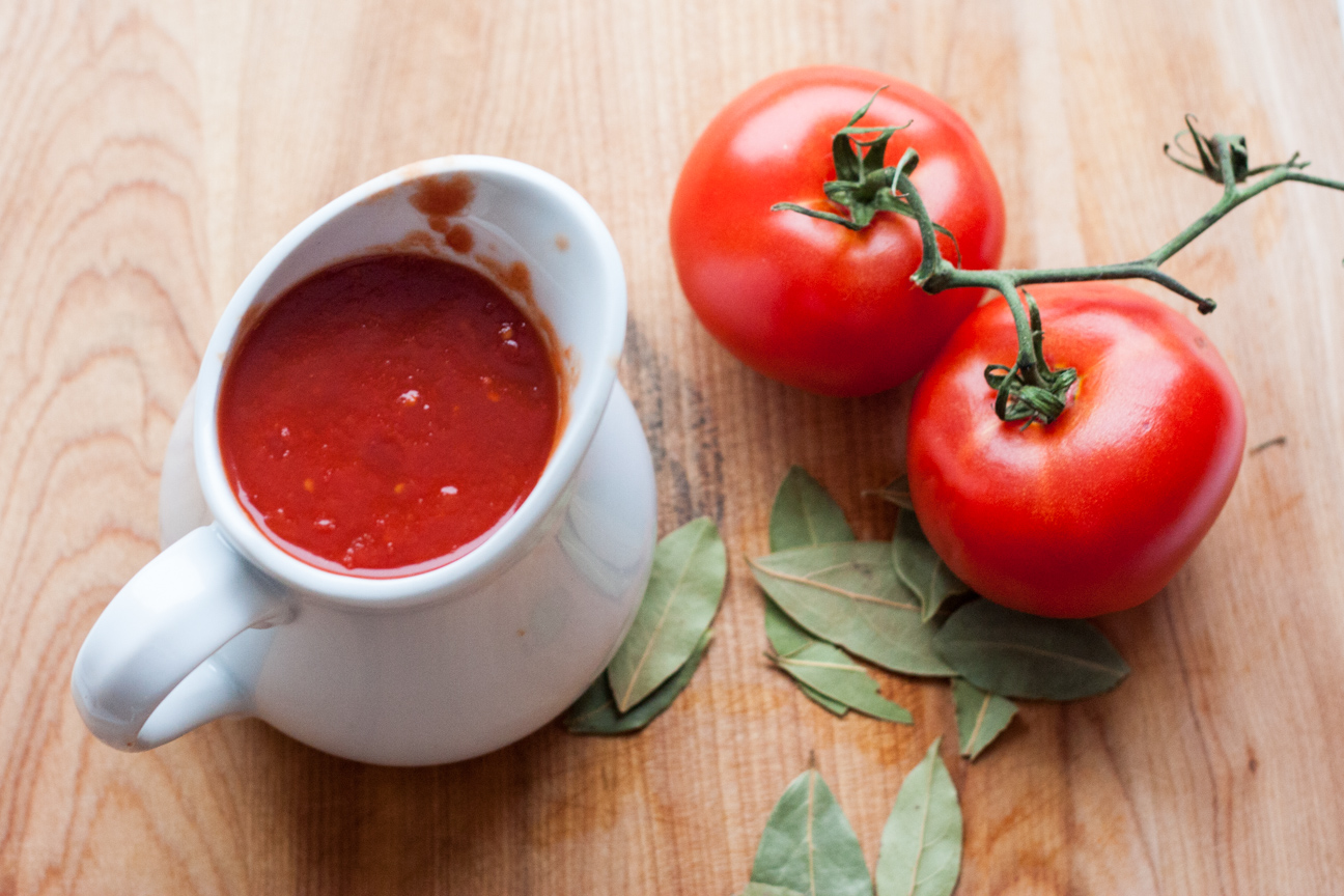 pitcher of tomato sauce and tomatoes