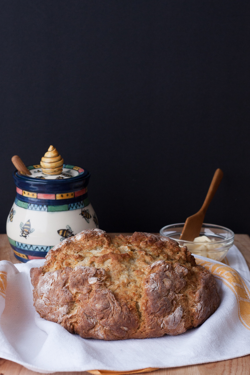 soda bread with honey pot and butter