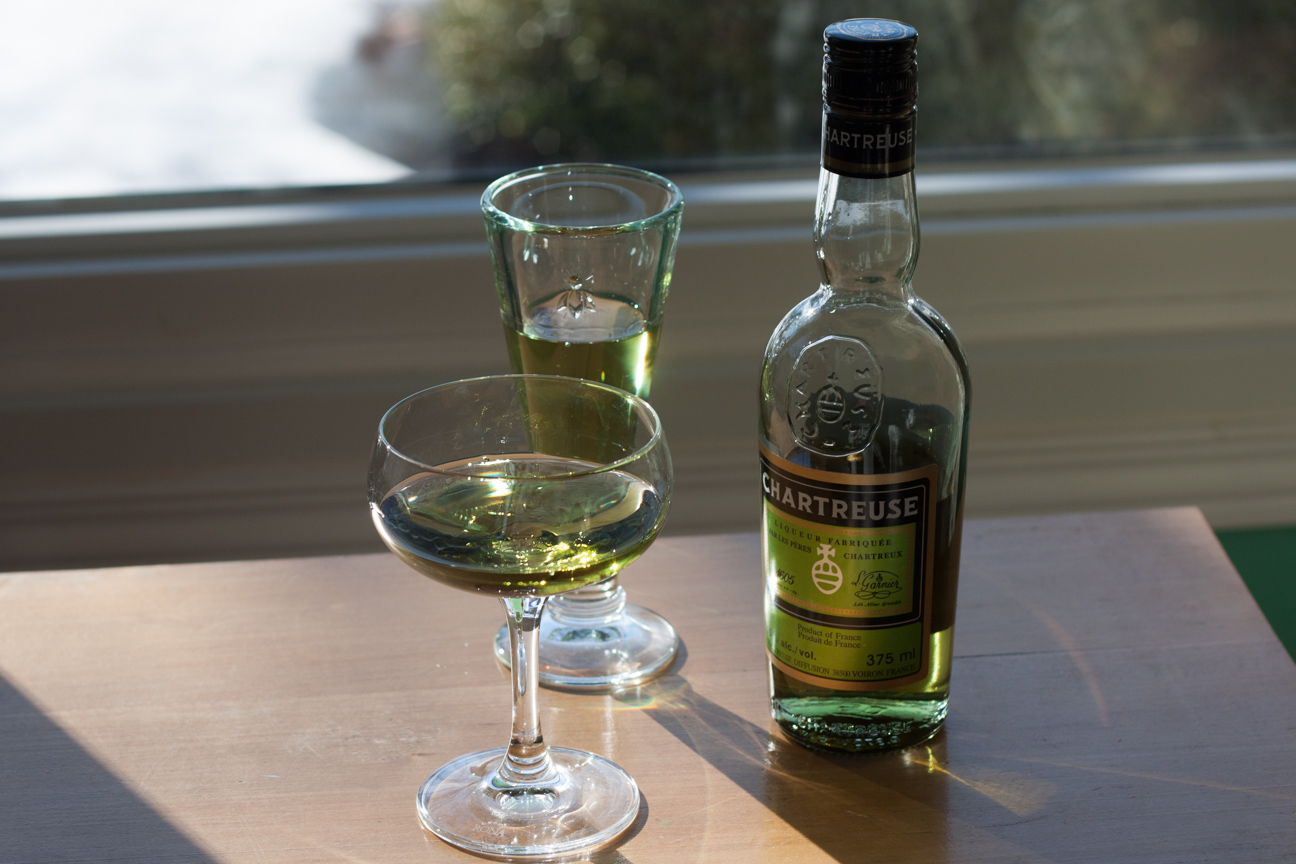 two glasses of Chartreuse and one bottle