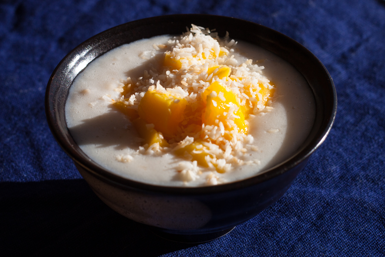 bol of porridge with mango and coconut