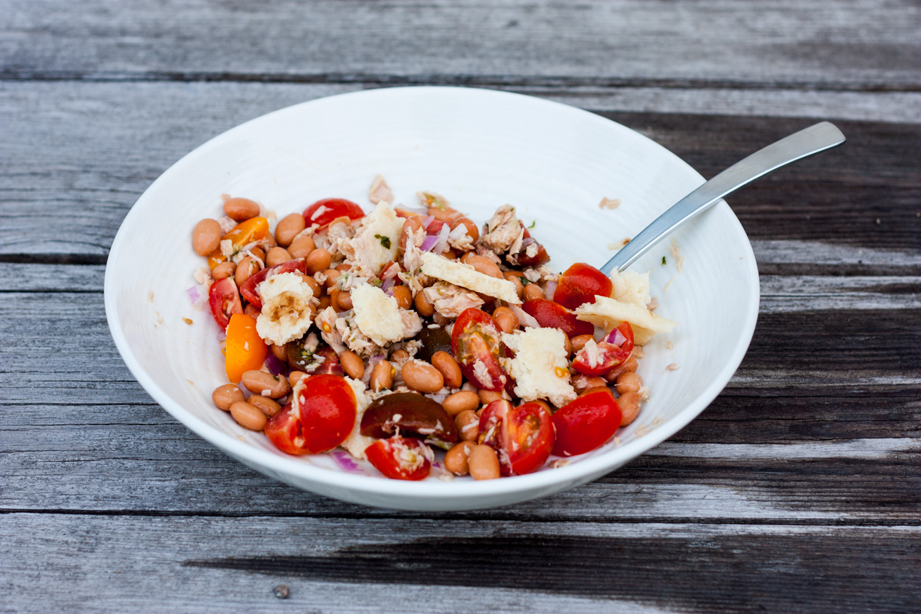 tuscan tuna, bean, tomato salad in a bowl