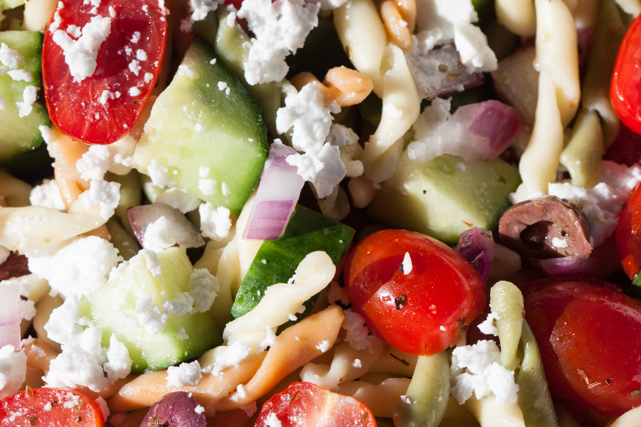 greek horiatiki pasta salad in a bowl