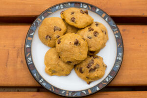 pumpkin chocolate chip cookies on a plate