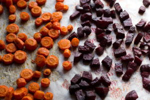 roasted beets and carrots on a tray