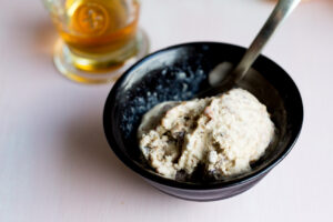 a bowl of ice cream and a glass of liqueur