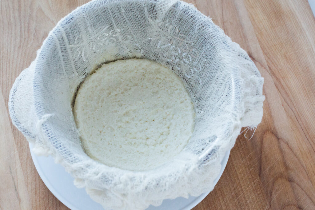 cheese curds in cheesecloth