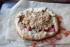 baked strawberry rhubarb ginger oat crumble galette